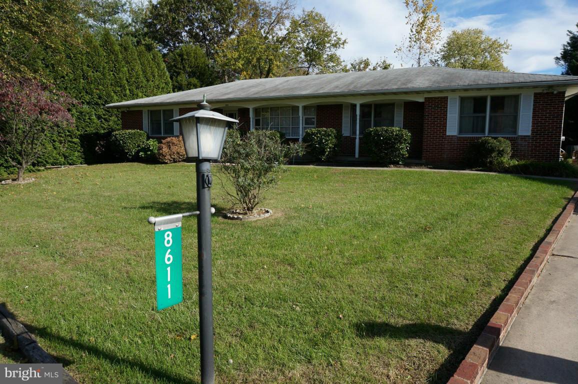 8611 McDaniel Road Baltimore, MD 21237 - Photo 1 of 21 a front view of house with yard and green space