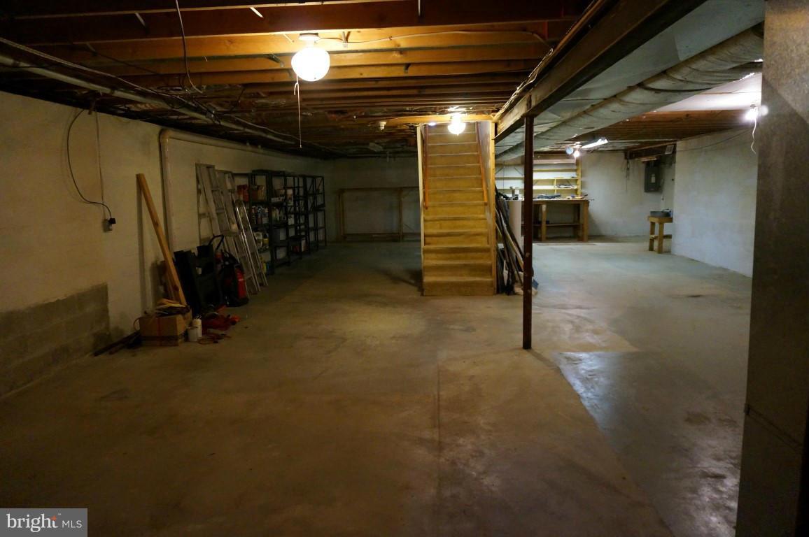 8611 McDaniel Road Baltimore, MD 21237 - Photo 18 of 21 a view of a room with gym equipment