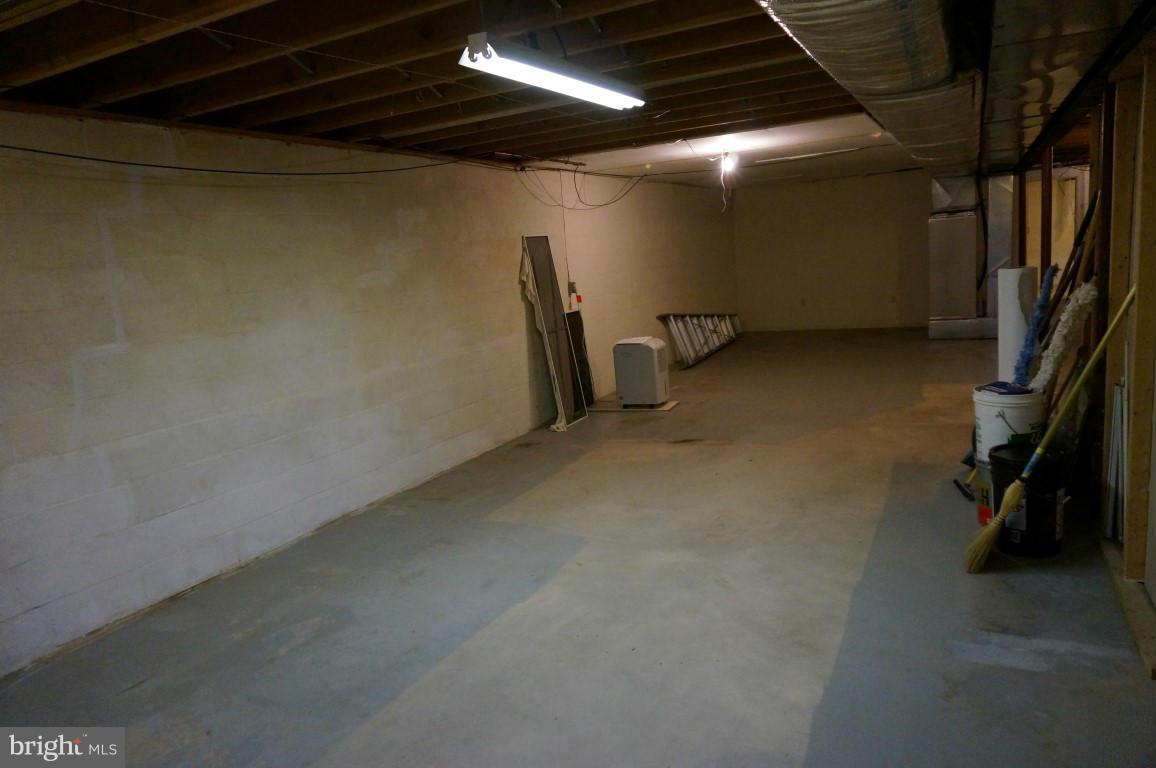 8611 McDaniel Road Baltimore, MD 21237 - Photo 19 of 21 a view of a room with gym equipment