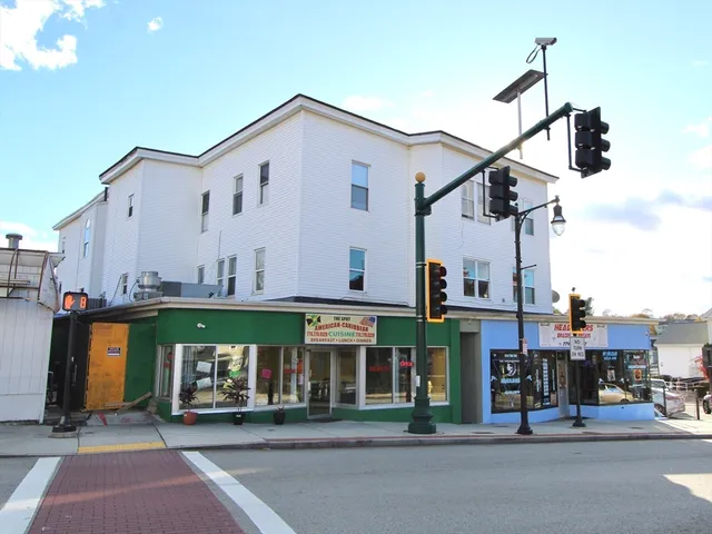 a view of a building with a street