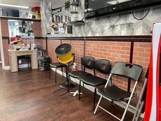 a view of a chairs and table in a room