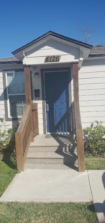 a view of a entryway door front of house