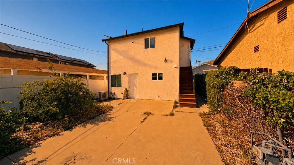 6851 Foothill Boulevard Tujunga, CA 91042 - Photo 48 of 50 a backyard of a house with yard and outdoor seating