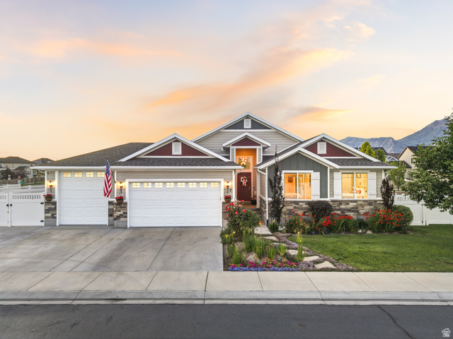 7 Sterling Loop Vineyard, UT 84059 - Photo 1 of 43 Craftsman-style facade with a stone foundation accent