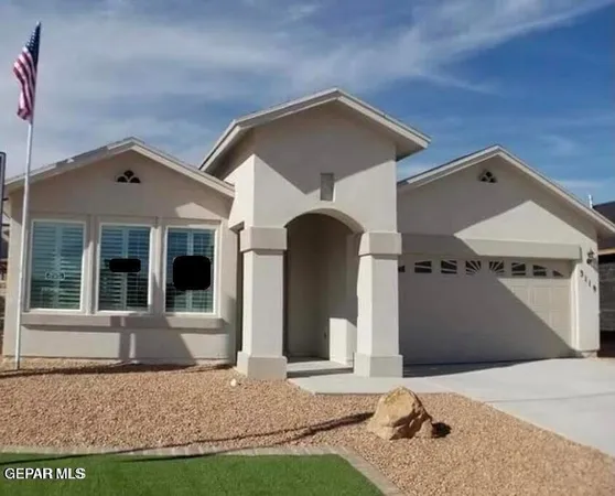a front view of a house with yard