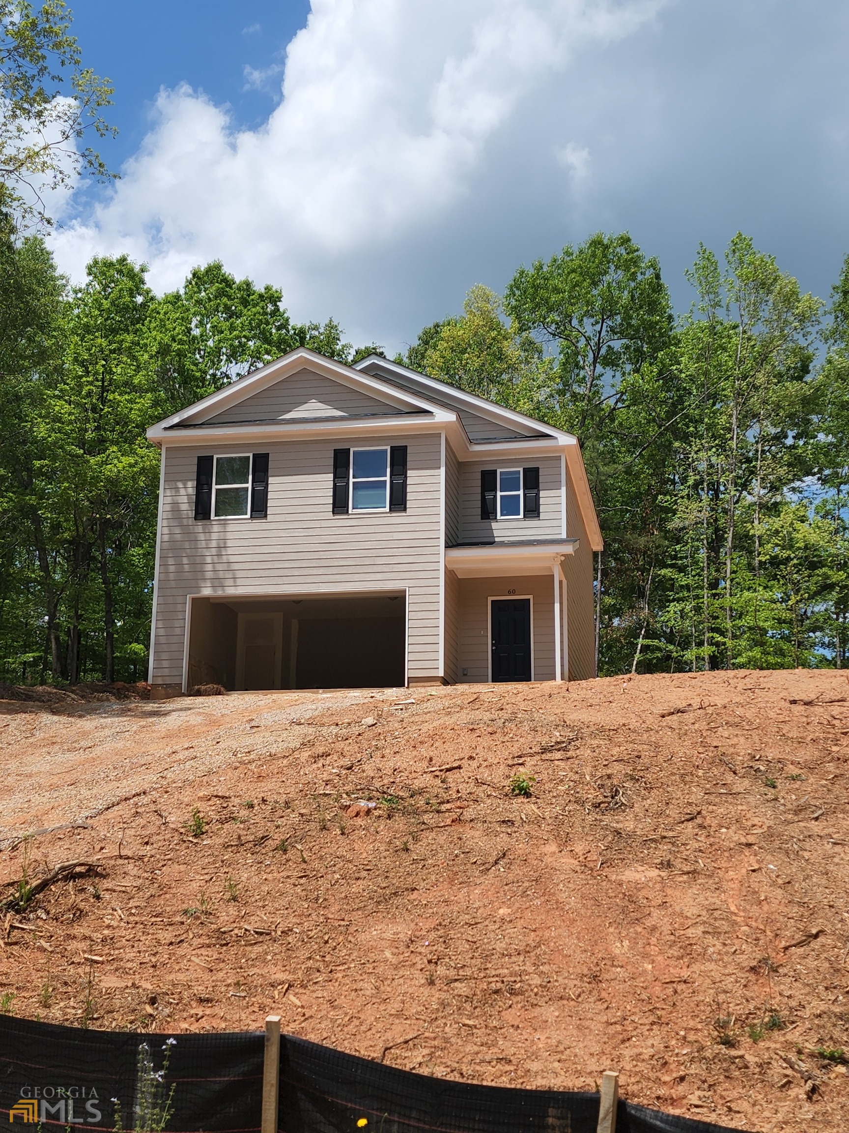 60-three Rivers Court Winder, GA 30680 - Photo 1 of 1 a front view of a house with a yard