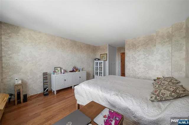 a bed room with a bed and a couch