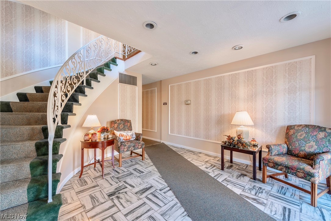 22701 Center Ridge Road, Unit 113 Rocky River, OH 44116 - Photo 26 of 29 Secure Main Entrance Lobby - Always beautiful and inviting!
