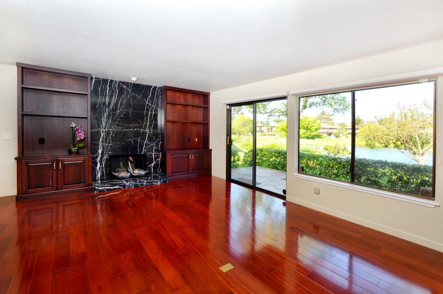 3850 Rio Road, Unit 40 Carmel, CA 93923 - Photo 6 of 28 a view of a room with wooden floor and windows