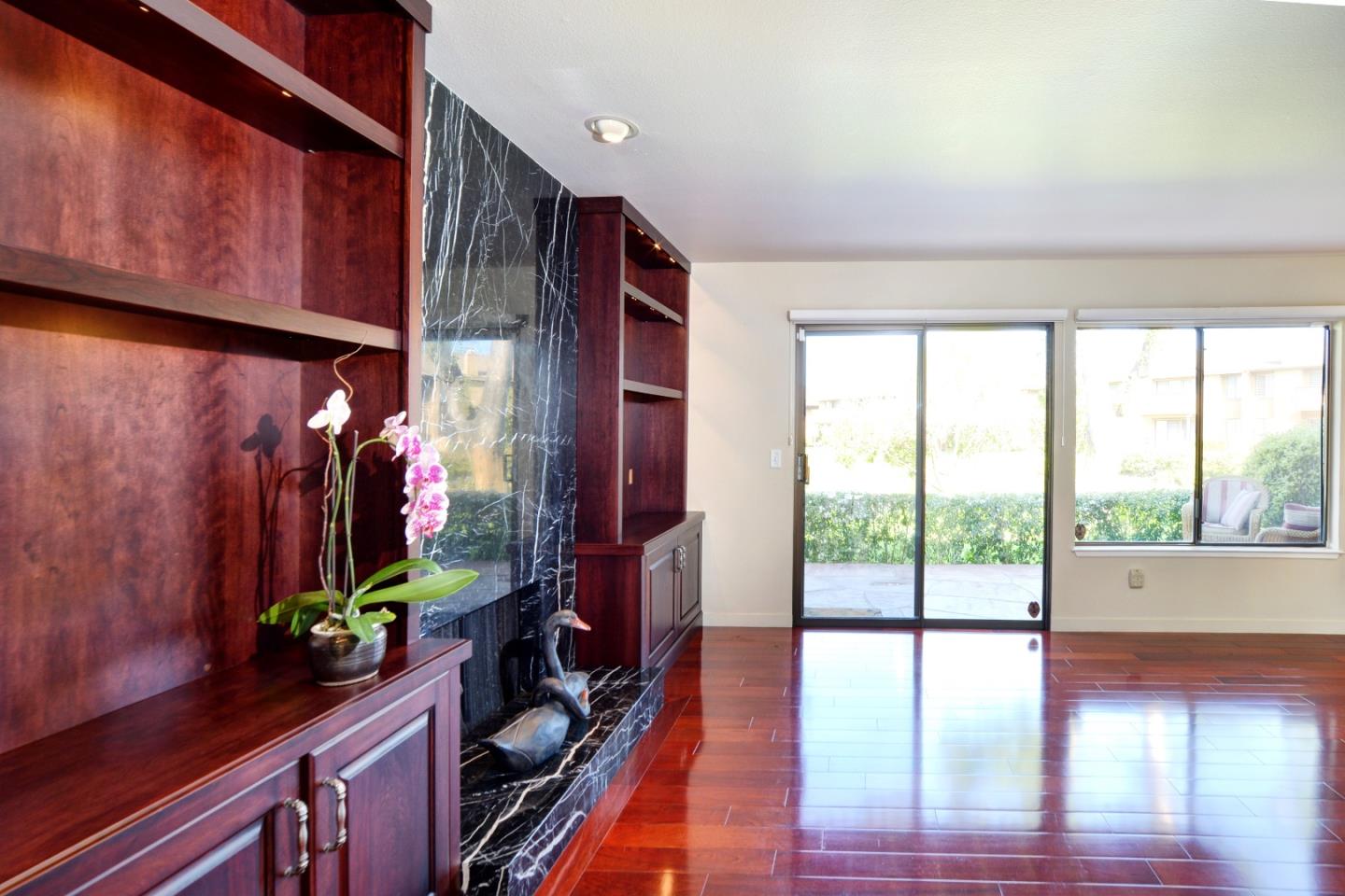 3850 Rio Road, Unit 40 Carmel, CA 93923 - Photo 8 of 28 a hallway with a potted plant on the floor
