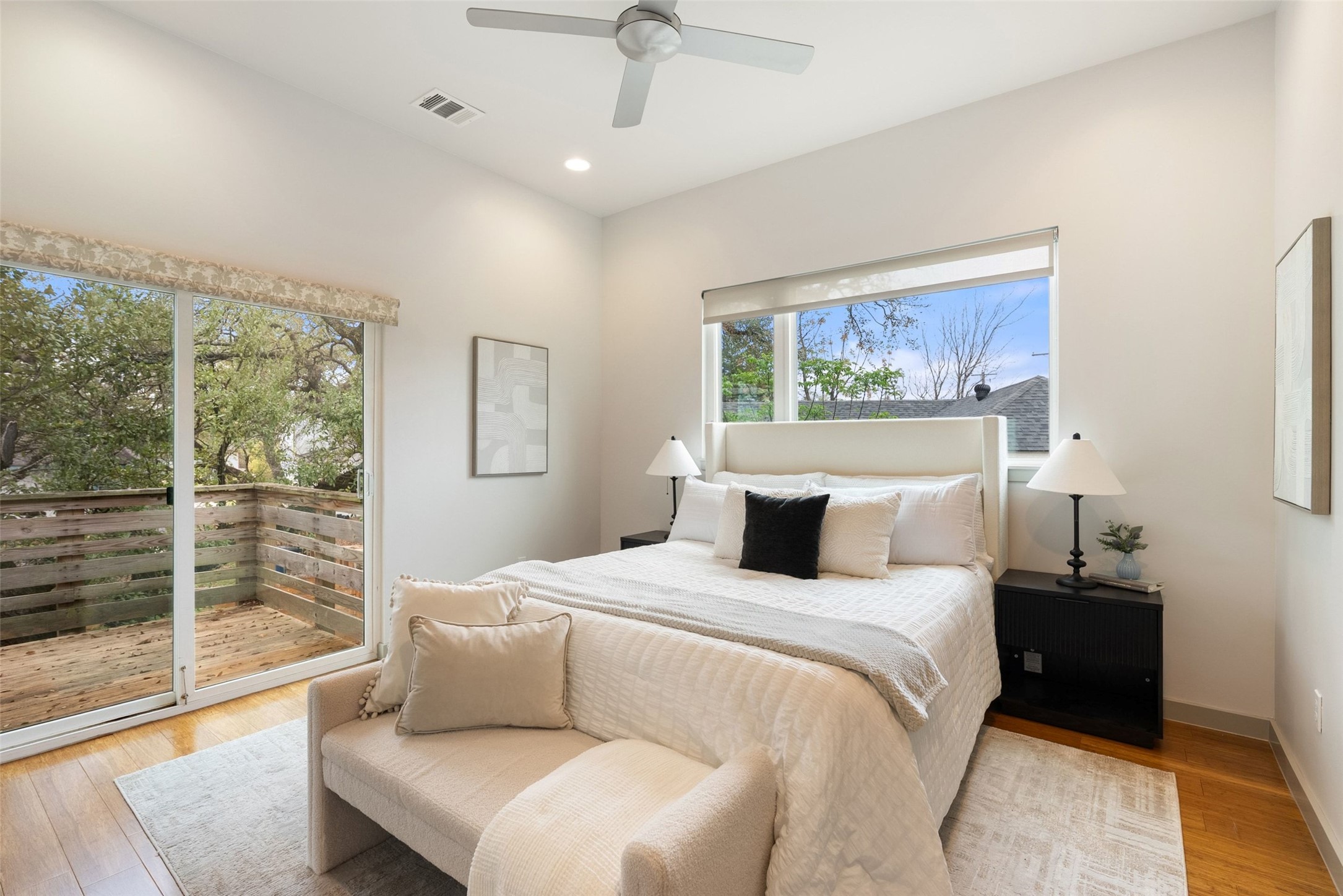 2805 Sol Wilson Avenue, Unit B Austin, TX 78702 - Photo 13 of 34 Primary bedroom with a access to second level patio.