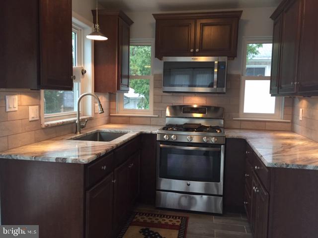 58 Home Road Hatboro, PA 19040 - Photo 14 of 50 The 2nd kitchen is also well set-up for heavy use.