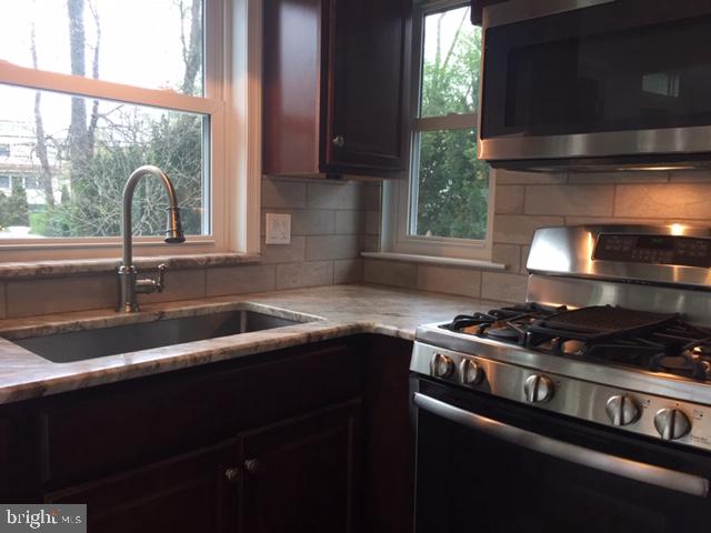 58 Home Road Hatboro, PA 19040 - Photo 15 of 50 Granite counters and stainless steel.