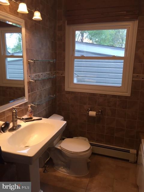 58 Home Road Hatboro, PA 19040 - Photo 16 of 50 The hall bath is both beautiful and functional.