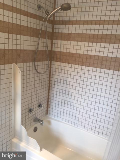 58 Home Road Hatboro, PA 19040 - Photo 32 of 50 A deep "soaking" tub and full tile walls