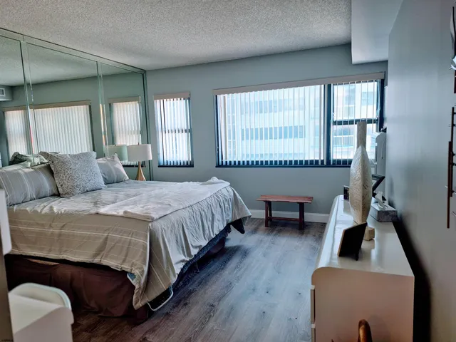 a bathroom with a sink double vanity and a mirror