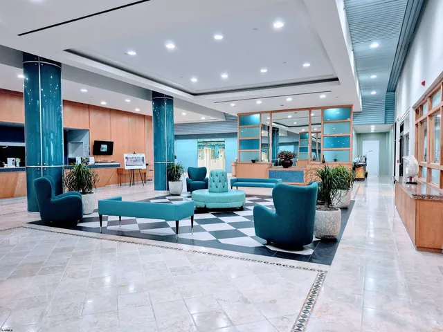 a bathroom with a large mirror