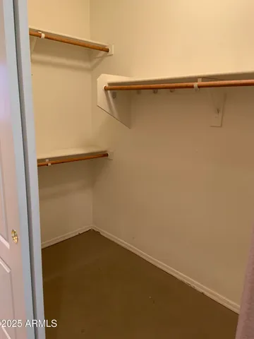 a bathroom with a double vanity sink and mirror