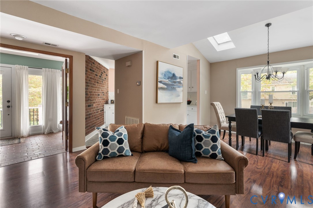 10324 Natural Bridge Road Chesterfield, VA 23236 - Photo 8 of 31 a living room with furniture or kitchen and a wooden floor