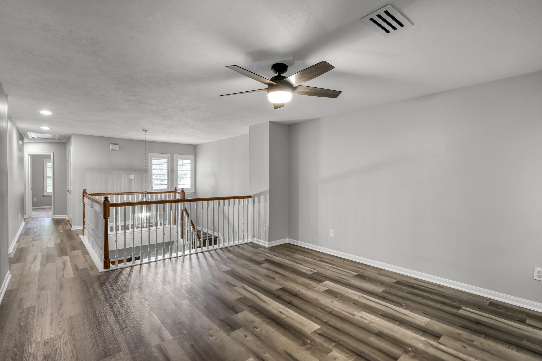 23 Alderon Woods Place Spring, TX 77382 - Photo 16 of 25 a view of entryway with wooden floor
