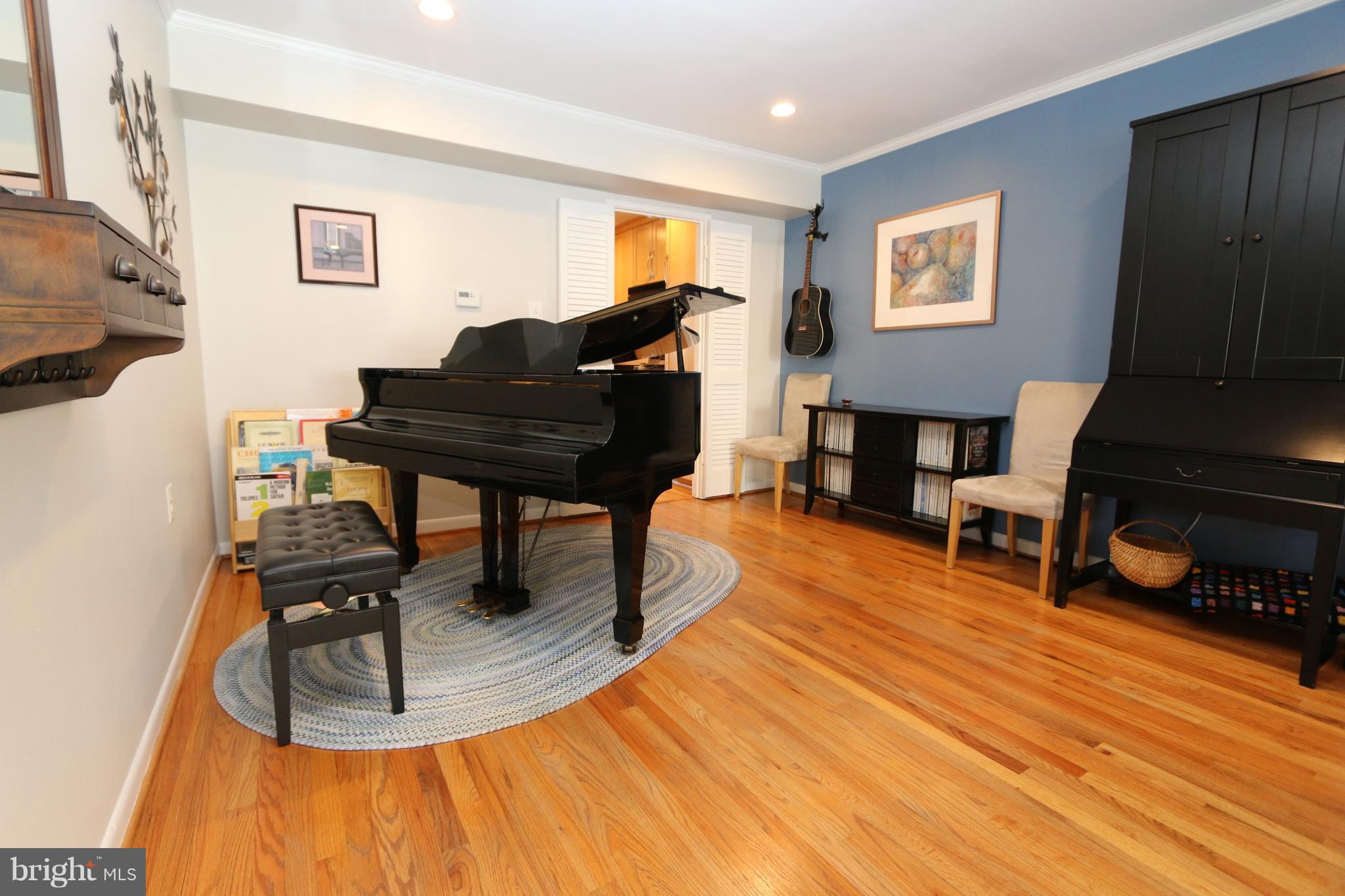 1583 Inlet Court Reston, VA 20190 - Photo 30 of 30 a living room with furniture and a wooden floor