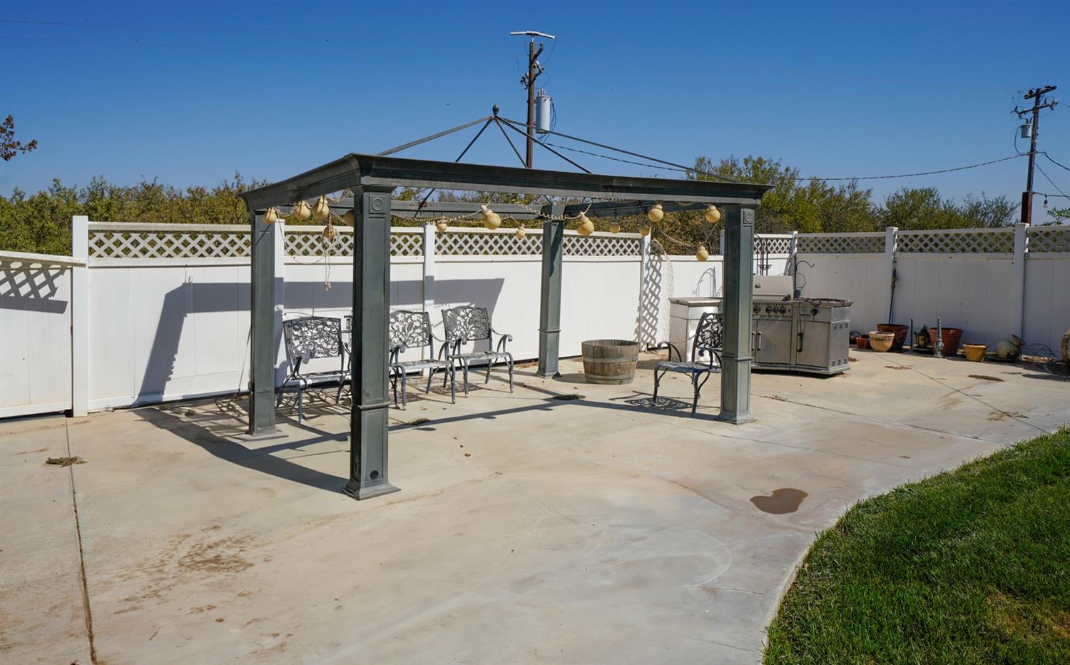 19360 Maple Street Laton, CA 93242 - Photo 37 of 53 a view of a terrace with chairs