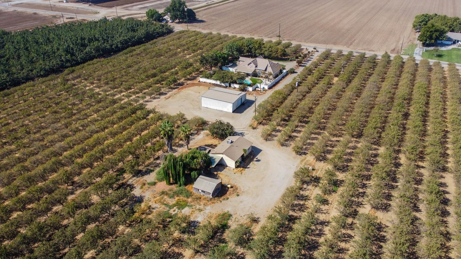 19360 Maple Street Laton, CA 93242 - Photo 47 of 53 a aerial view of a house with a yard