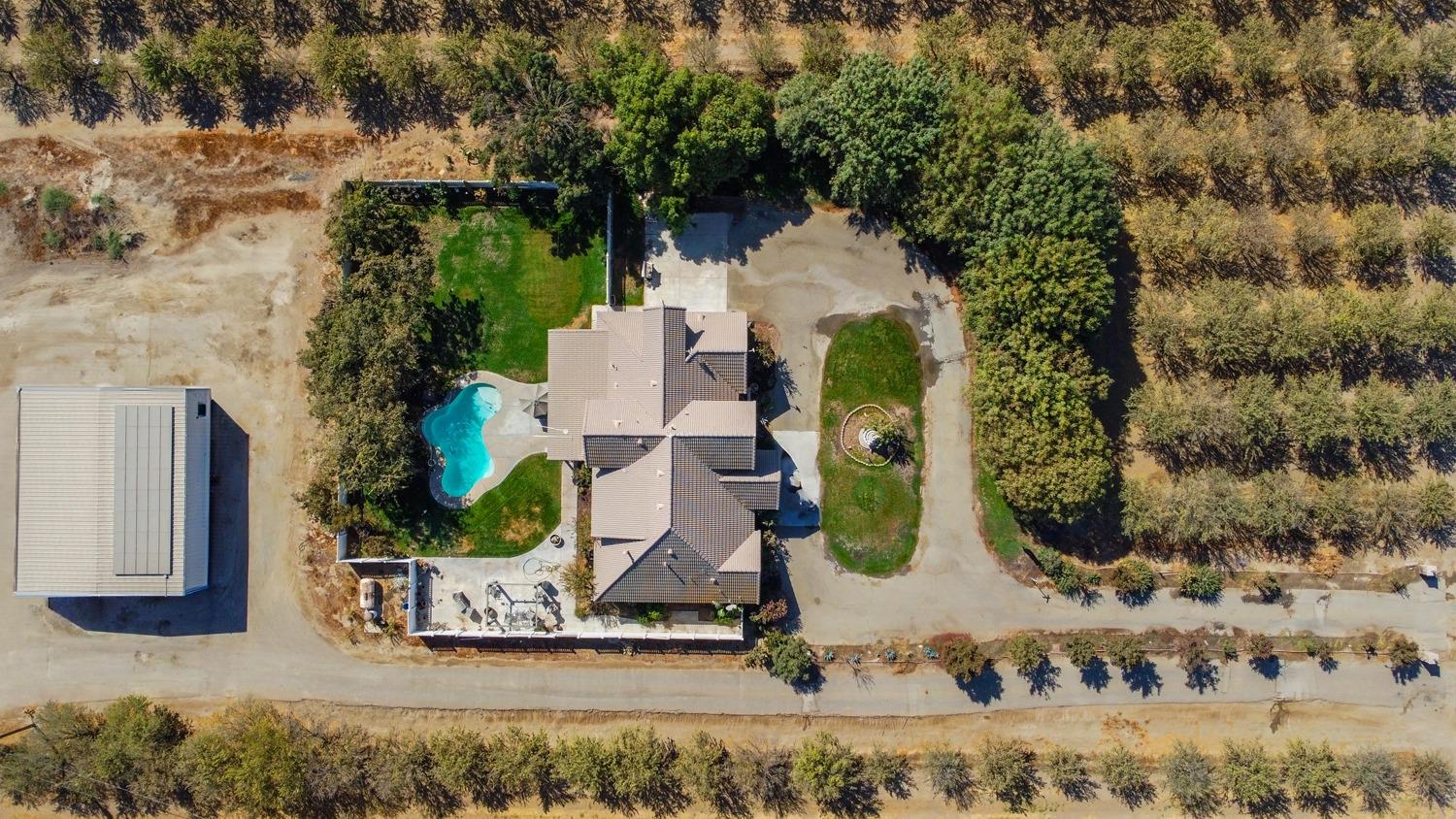 19360 Maple Street Laton, CA 93242 - Photo 52 of 53 an aerial view of a house with outdoor space