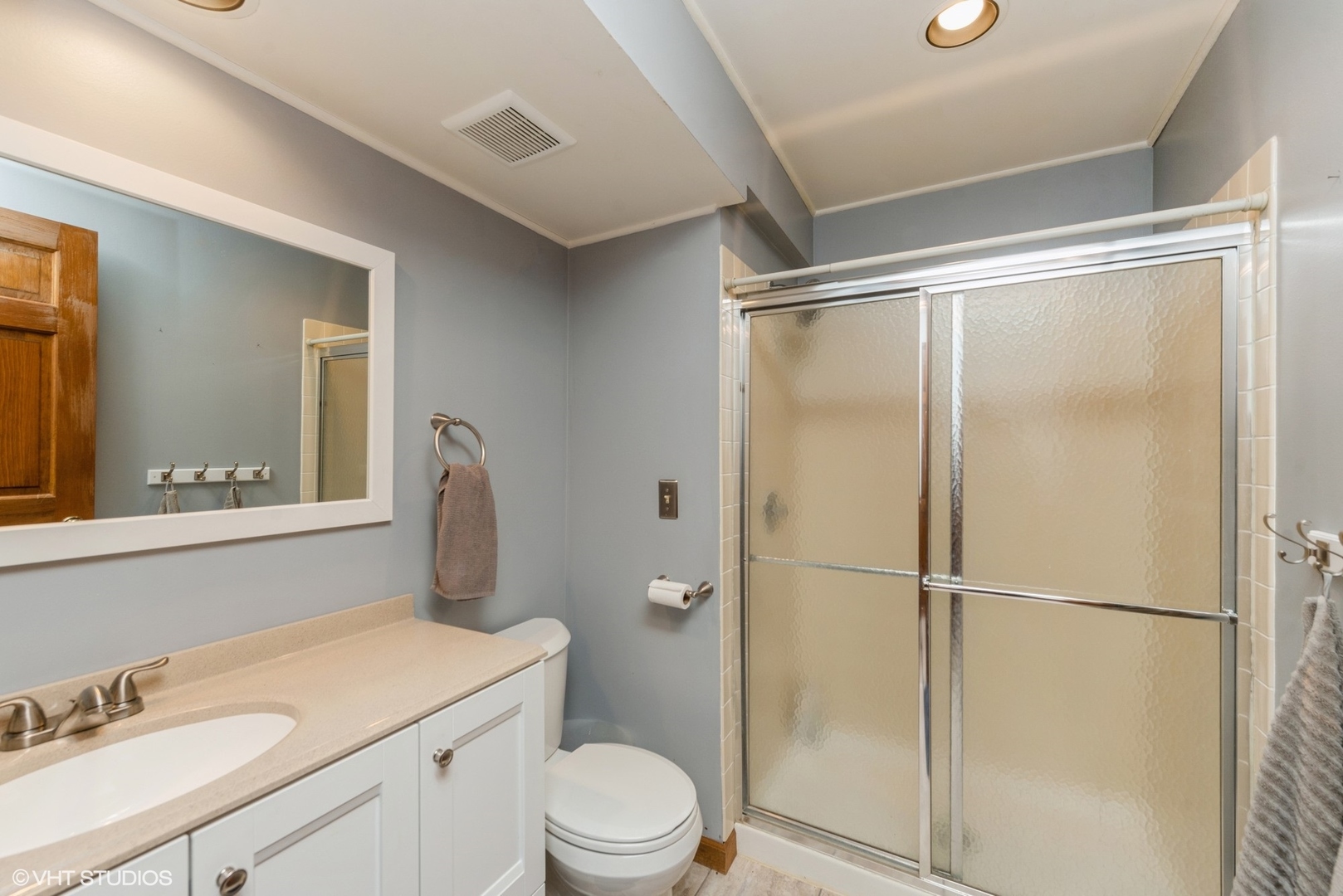 267 Foxmoor Road Fox River Grove, IL 60021 - Photo 12 of 22 a bathroom with a granite countertop sink toilet a mirror and shower