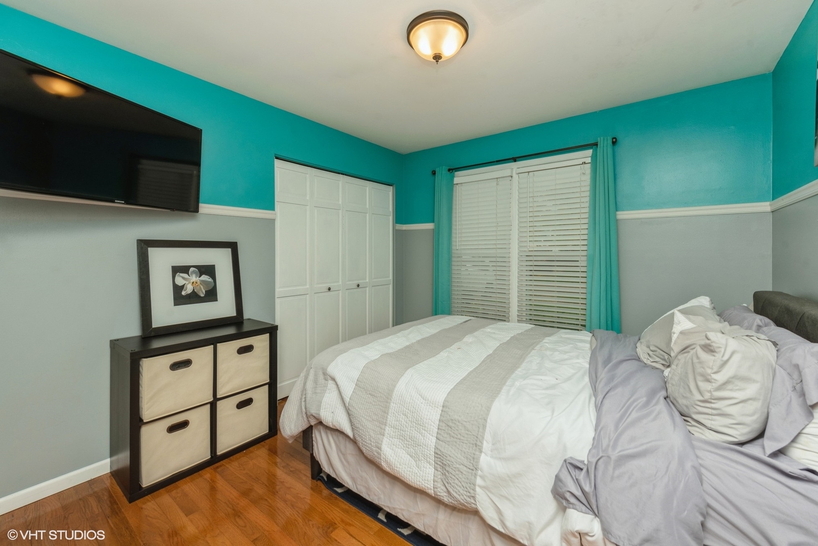 267 Foxmoor Road Fox River Grove, IL 60021 - Photo 13 of 22 a bedroom with a bed and a flat screen tv