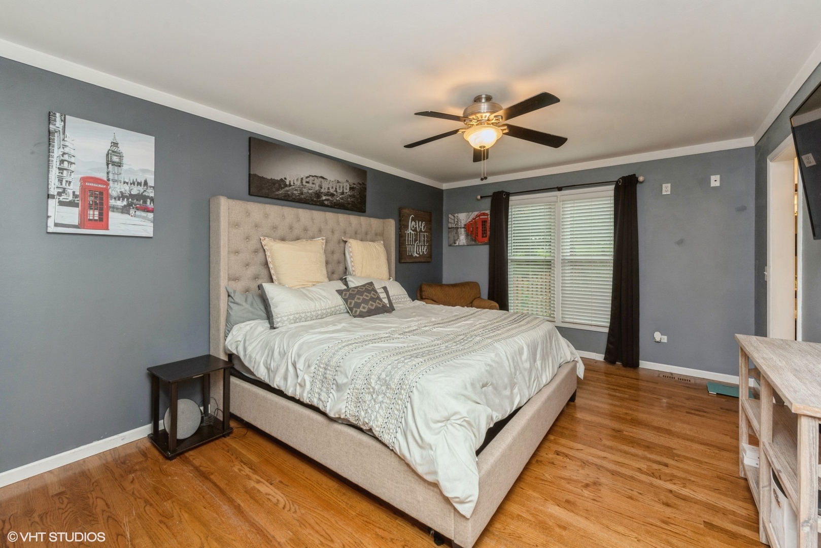 267 Foxmoor Road Fox River Grove, IL 60021 - Photo 9 of 22 a bedroom with a large bed and a chandelier