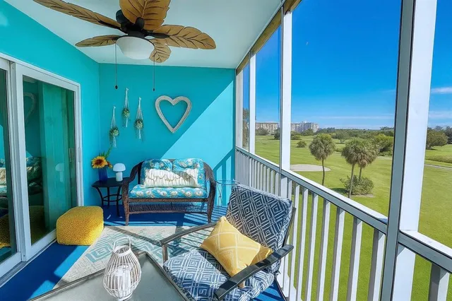 a view of a room that has a bed in it