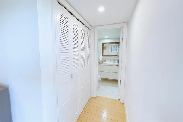 a kitchen with a sink stove and microwave