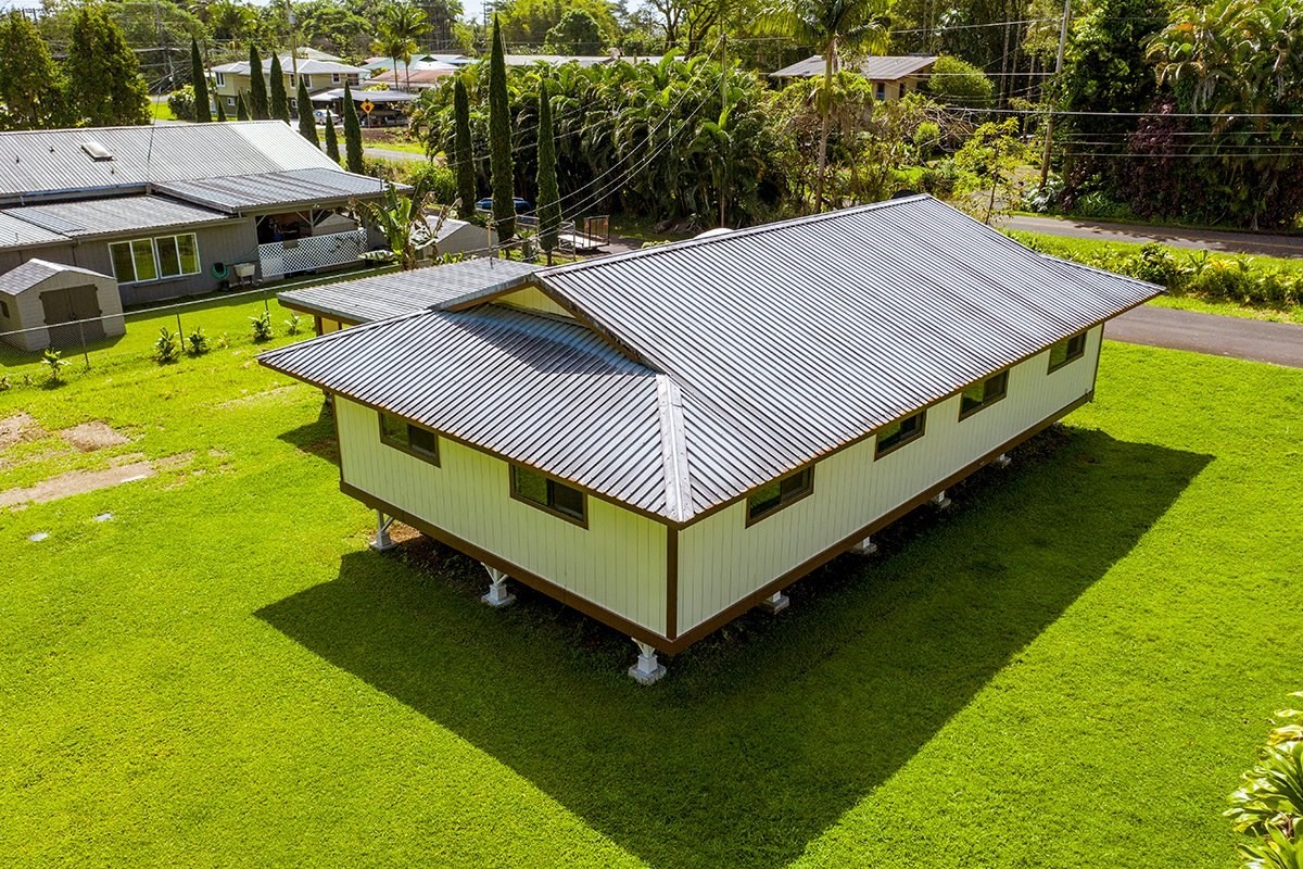 17-4018 Kuaaina Road, Unit 105 Kurtistown, HI 96749 - Photo 18 of 22 a view of a backyard with a patio