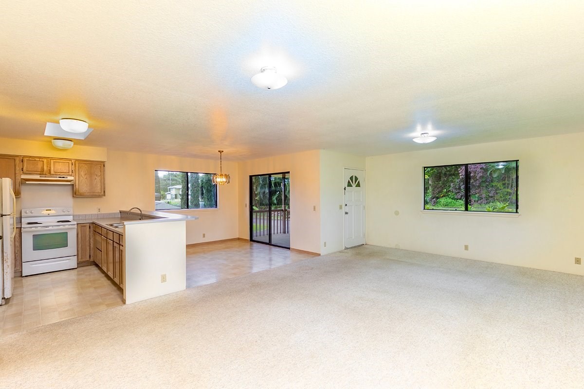 17-4018 Kuaaina Road, Unit 105 Kurtistown, HI 96749 - Photo 3 of 22 a view of a kitchen with furniture and a kitchen view