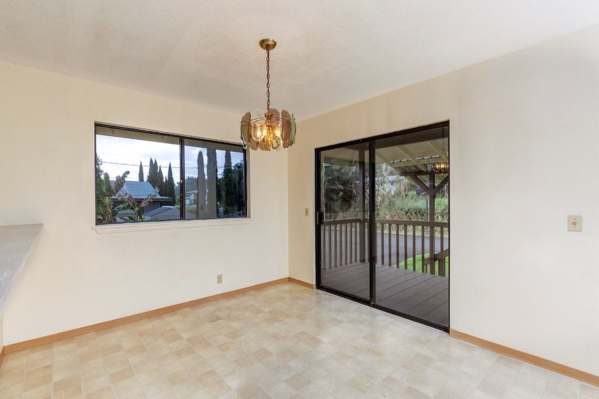 17-4018 Kuaaina Road, Unit 105 Kurtistown, HI 96749 - Photo 7 of 22 a view of empty room with windows