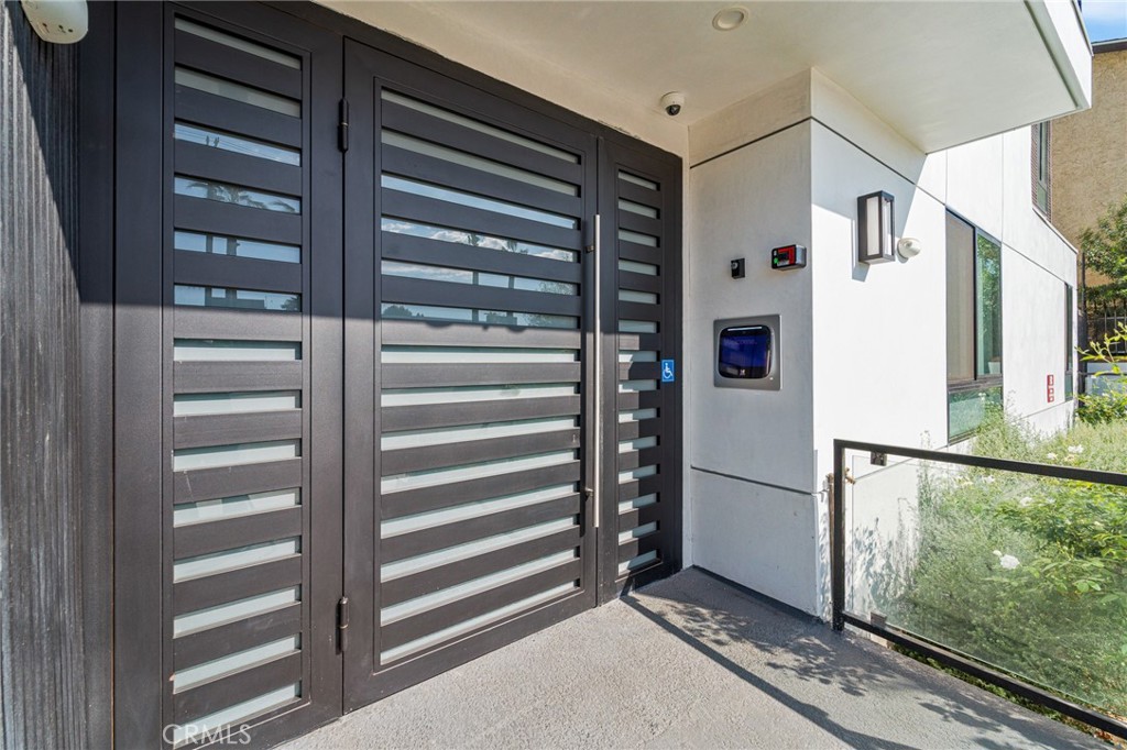 7510 Sepulveda Boulevard, Unit 101 Van Nuys, CA 91405 - Photo 4 of 16 a view of kitchen with stainless steel appliances cabinets and a window