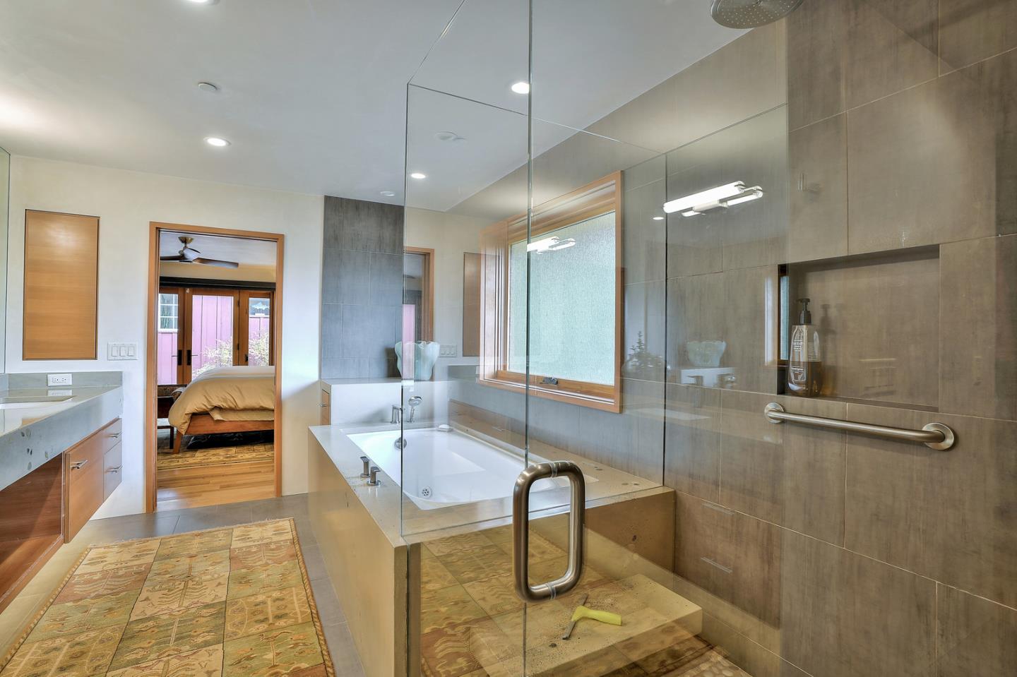 24651 Cabrillo Street Carmel, CA 93923 - Photo 20 of 42 a lobby with furniture and a rug