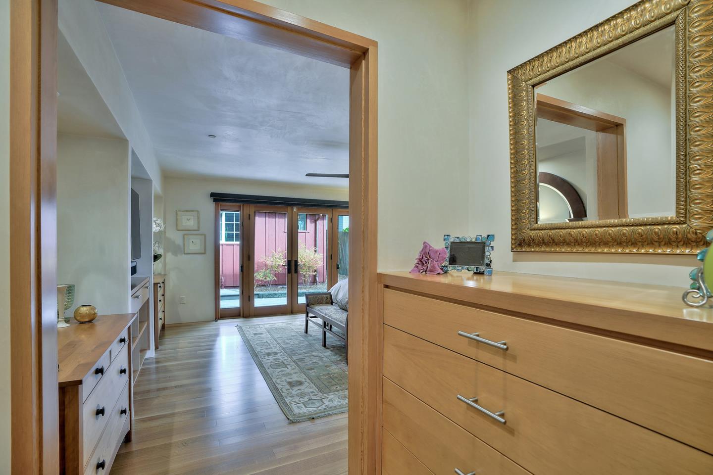 24651 Cabrillo Street Carmel, CA 93923 - Photo 21 of 42 a living room with furniture and a window