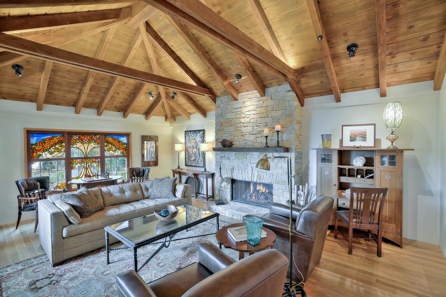 24651 Cabrillo Street Carmel, CA 93923 - Photo 3 of 42 a living room with furniture a ceiling fan and a rug