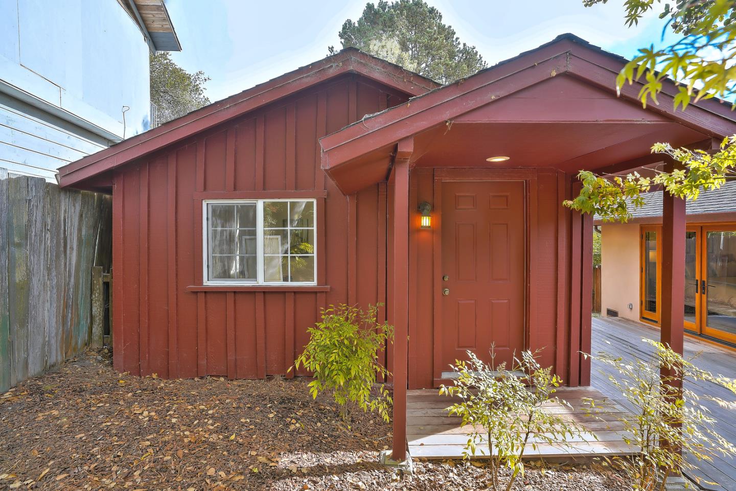 24651 Cabrillo Street Carmel, CA 93923 - Photo 36 of 42 a view of a house with a yard