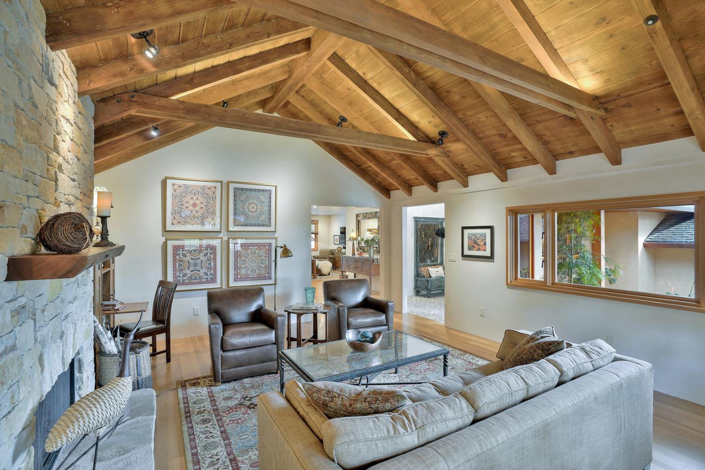 24651 Cabrillo Street Carmel, CA 93923 - Photo 4 of 42 a living room with furniture and wooden floor
