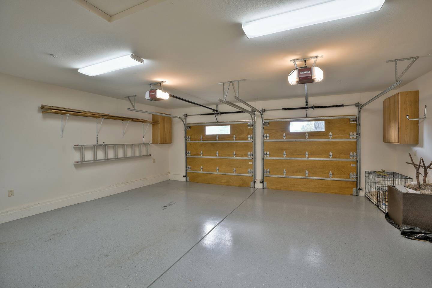 24651 Cabrillo Street Carmel, CA 93923 - Photo 41 of 42 a view of a room with racks on the wall