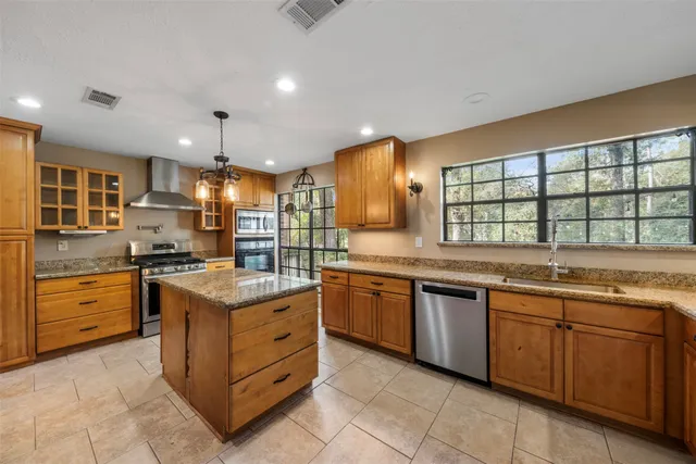 $565,000 | 23 Eagle Rock Place, The Woodlands, TX 77381