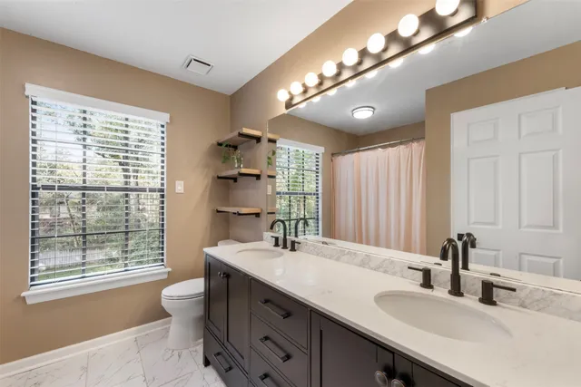 $565,000 | 23 Eagle Rock Place, The Woodlands, TX 77381