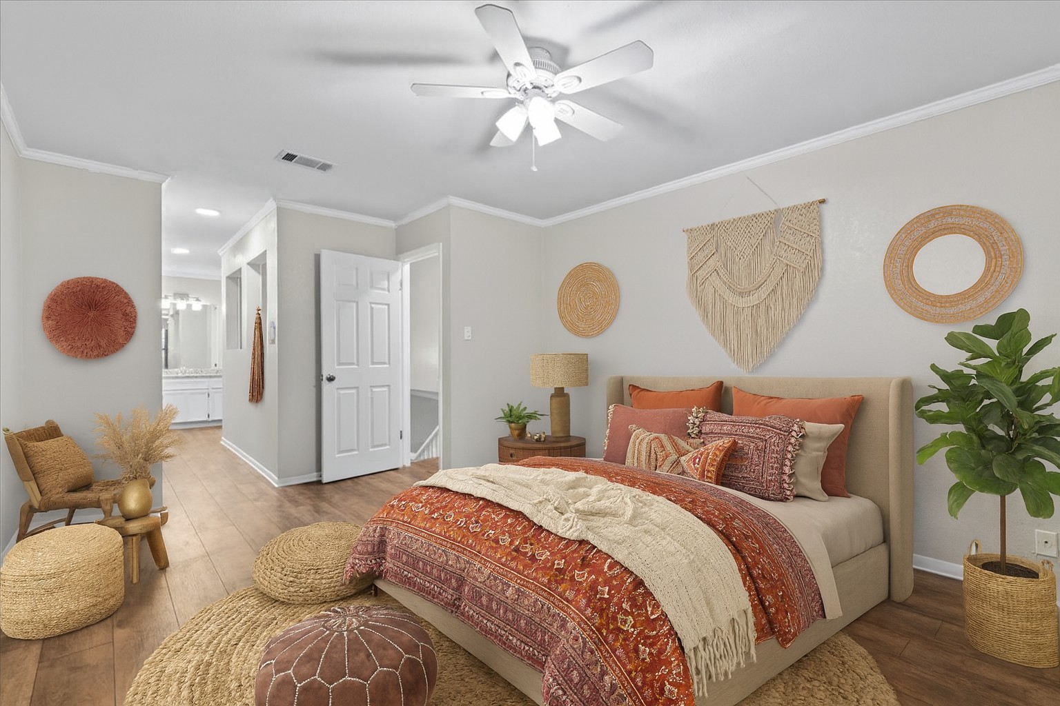 201 East Noton Street, Unit 104 Pflugerville, TX 78660 - Photo 15 of 35 a spacious bedroom with a bed and painting on the wall