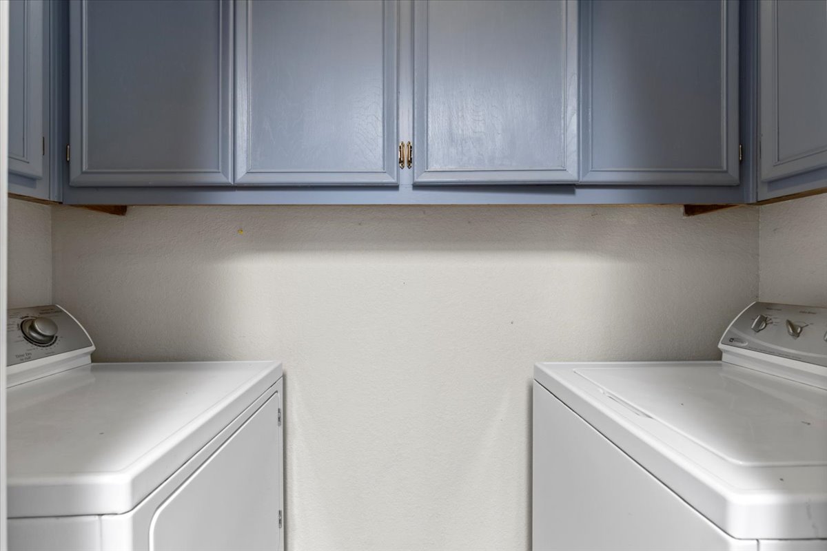 201 East Noton Street, Unit 104 Pflugerville, TX 78660 - Photo 9 of 35 a utility room with dryer and washer