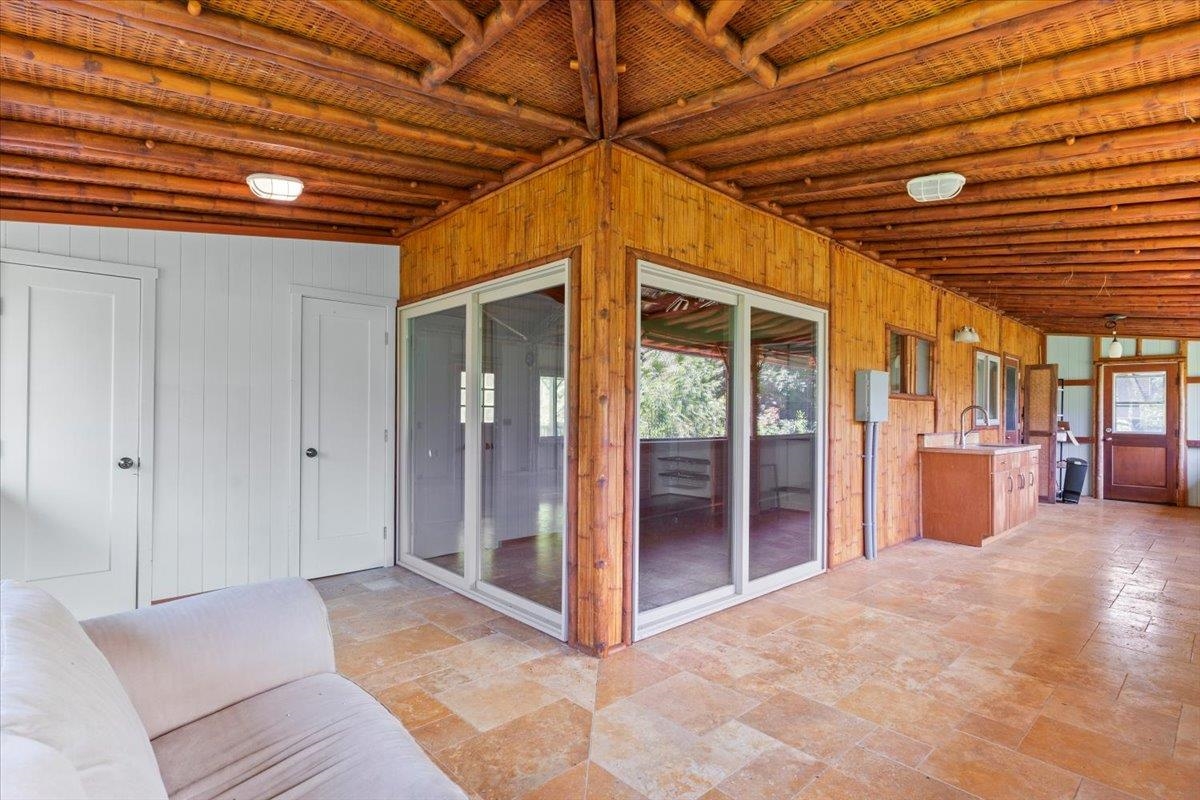 590 East Kuiaha Road Haiku, HI 96708 - Photo 25 of 42 a view of a room with wooden walls