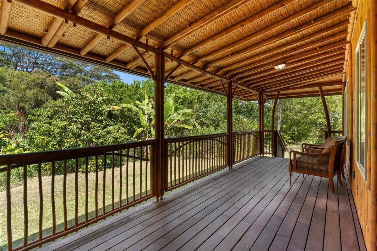 590 East Kuiaha Road Haiku, HI 96708 - Photo 10 of 42 a view of a balcony with wooden floor