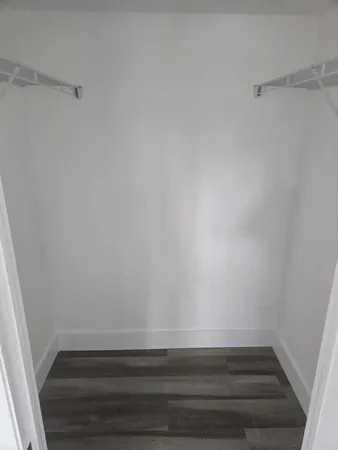 a room with a bench and dryer